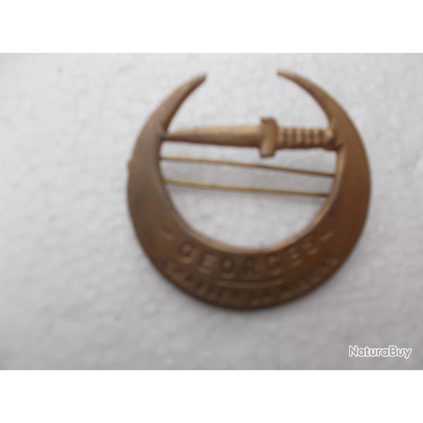 insigne commando GEORGES chassez la mis�re ,matricul�,�tat comme neuf!!