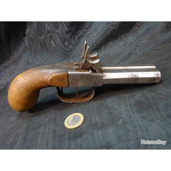 pistolet coup de poing deux coups � capsule
