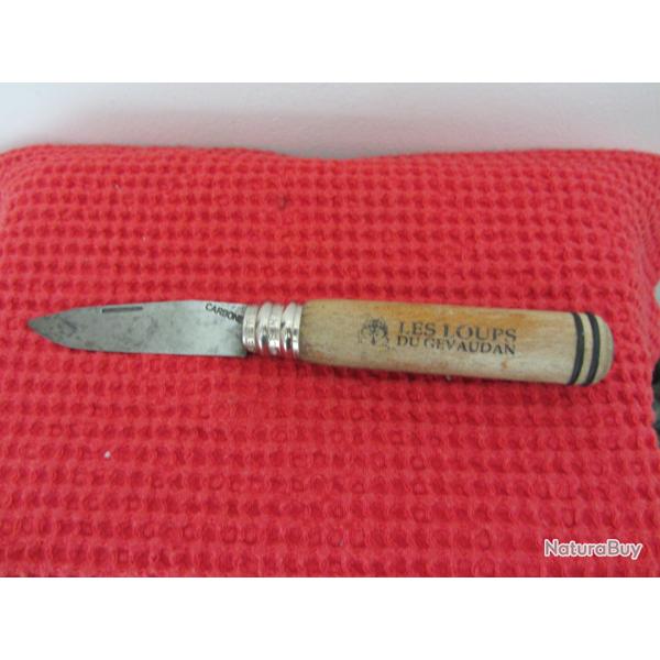 Couteau pliant "les loups du G�vaudan" 1985