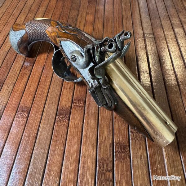 SUPERBE ET RARE LUXUEUX PISTOLET MARINE A SILEX JUXTAPOS�S CANON EN BRONZE PIECE DE POUCE EN IVOIRE