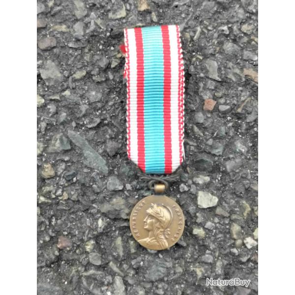 R�duction m�daille comm�morative d' AFN original.