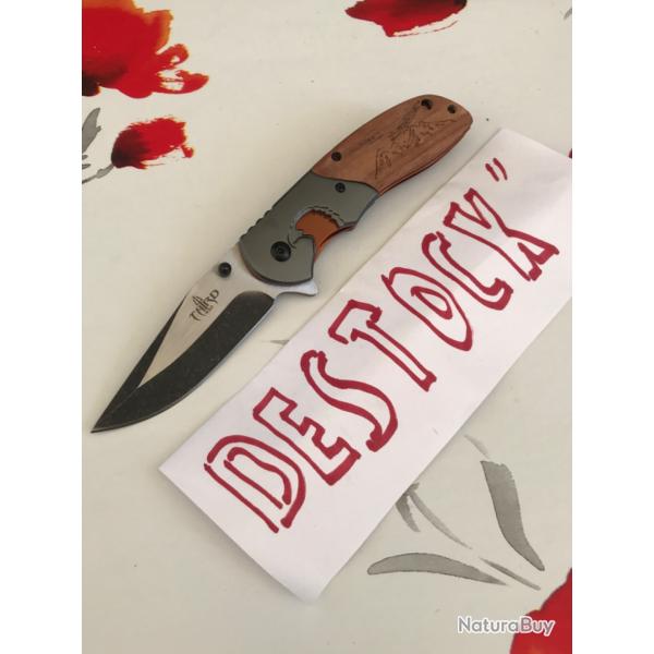 Couteau  ��aigle�� ouverture assist�e