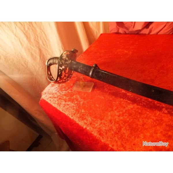 Sabre graver (MIT GOTT FUR KAISER ) troph�e d'arme et blason.  Monture d�couper et graver,