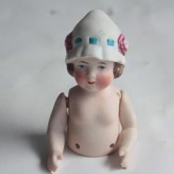 Demi figurine porcelaine biscuit Fillette bras articulés