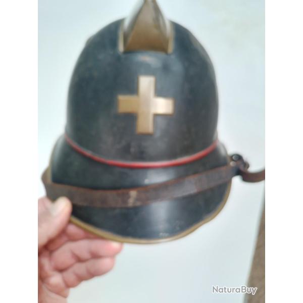 ancien casque de pompier suisse pour collection ou deco
