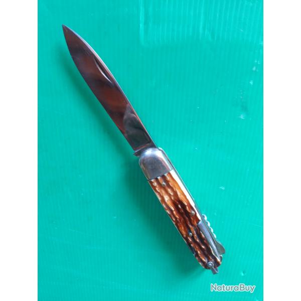 COUTEAU PLIANT MULTI FONCTIONS : A L ETOILE ,  MANUFRANCE ST ETIENNE  . AUCUN  JEU  .