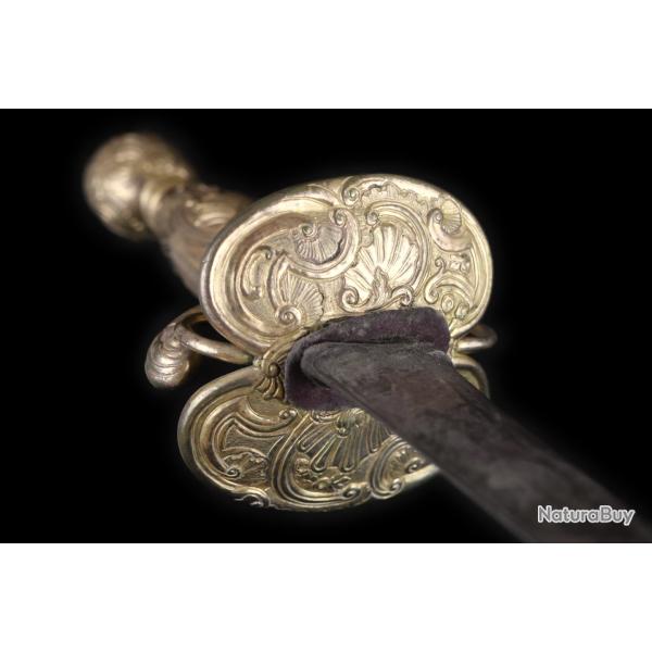 N32 - Epe de cour rocaille en laiton dor