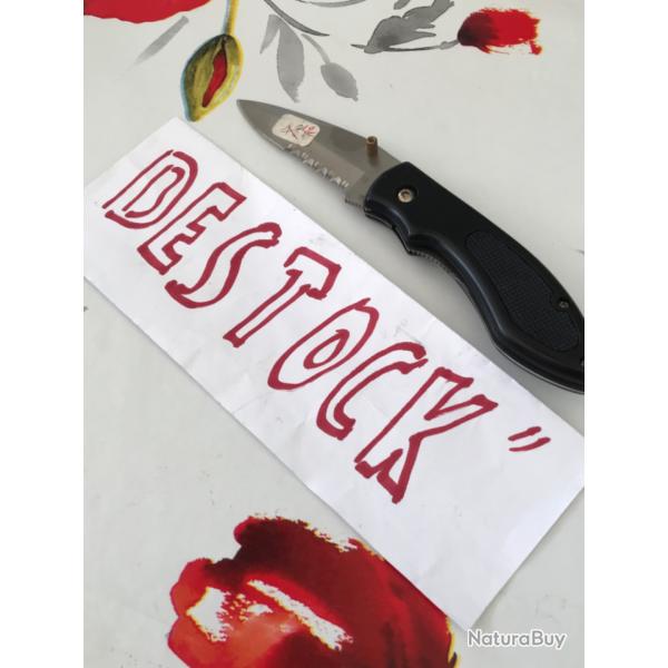 Couteau avec lame semi dent�e