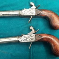 Pistolets &agrave; coffre  &agrave; balle forc&eacute;e d&eacute;tente rentrante.19&egrave; ou d&eacute;but 20&egrave;