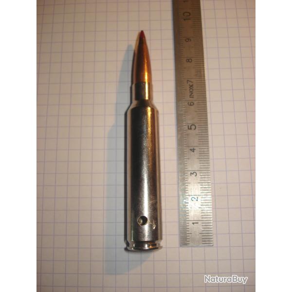 une cartouche de 300 PRC neutralis�e, amorce percut�e, �tui perc�, pour collection, �tui nickel�