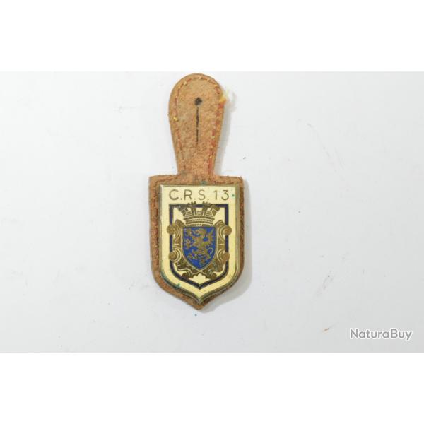 Insigne CRS C.R.S. 13. Dos vert de gris,  nettoyer.