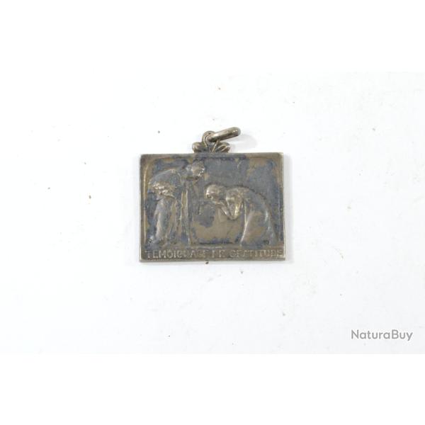 M�daille en bronze argent� sign�e J Marin L'oeuvre La maison des invalides. Ann�es 1930 - 1950