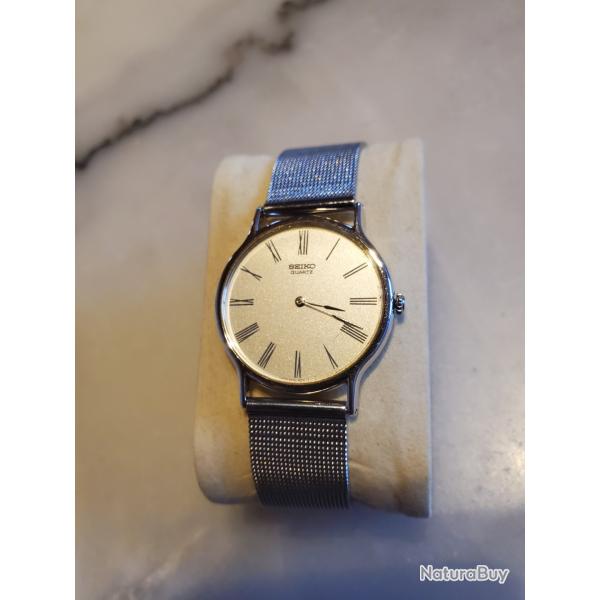 Montre Seiko quartz extra plate bracelet mailles milanaise pile neuve fonctionne parfaitement