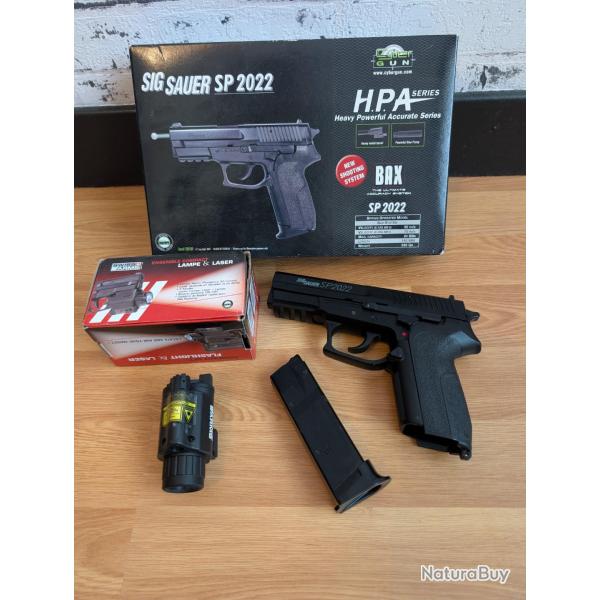 Lot de 2 pistolets � billes , lampe/laser , billes