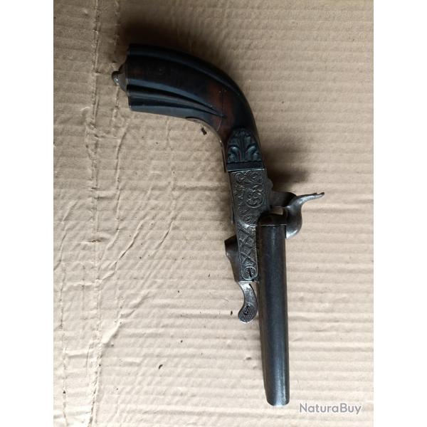 Pistolet a percussion juxtapos ray