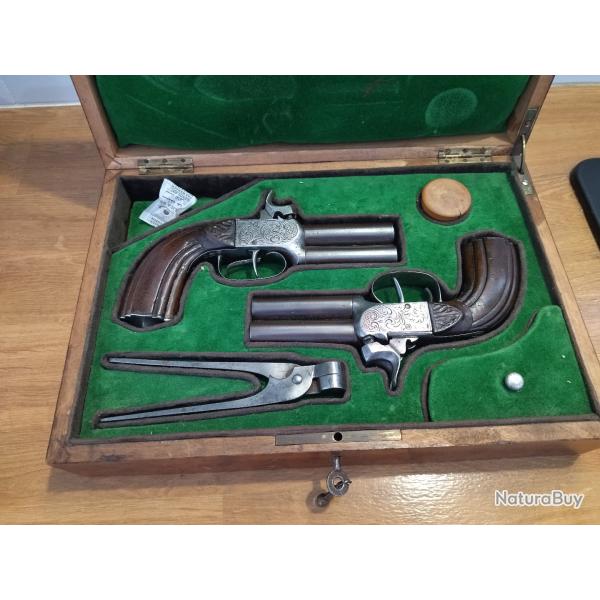 paire de pistolet � piston en coffret