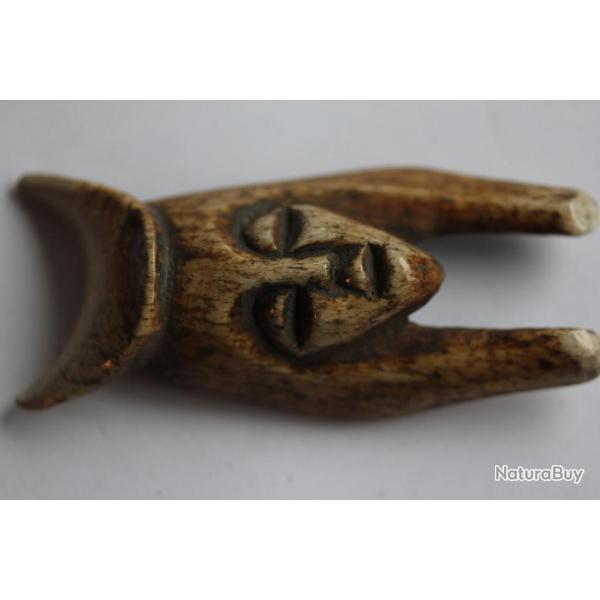 Ancienne amulette ethnique os