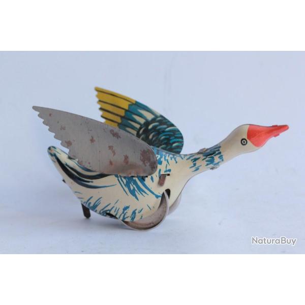 Ancien jouet m�canique en t�le Oie