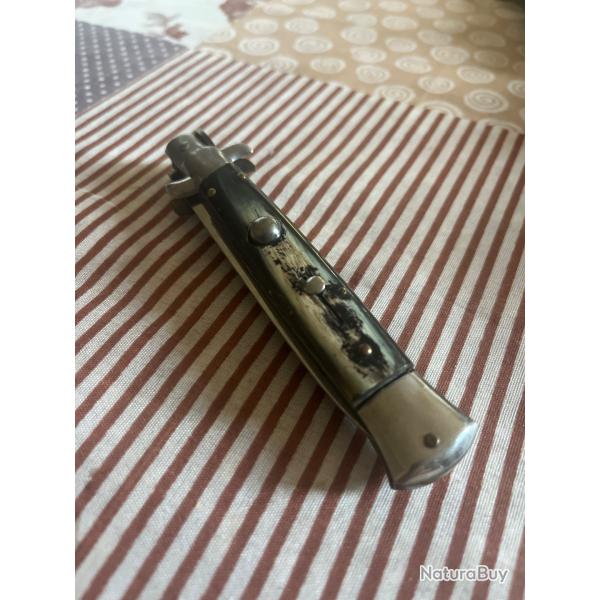 Couteau pliant a systme d'ouverture