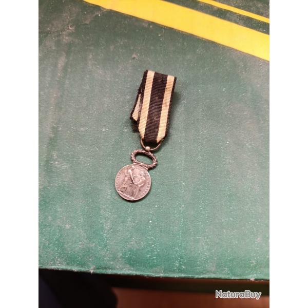 R�duction de m�daille soci�t� de secours mutuels