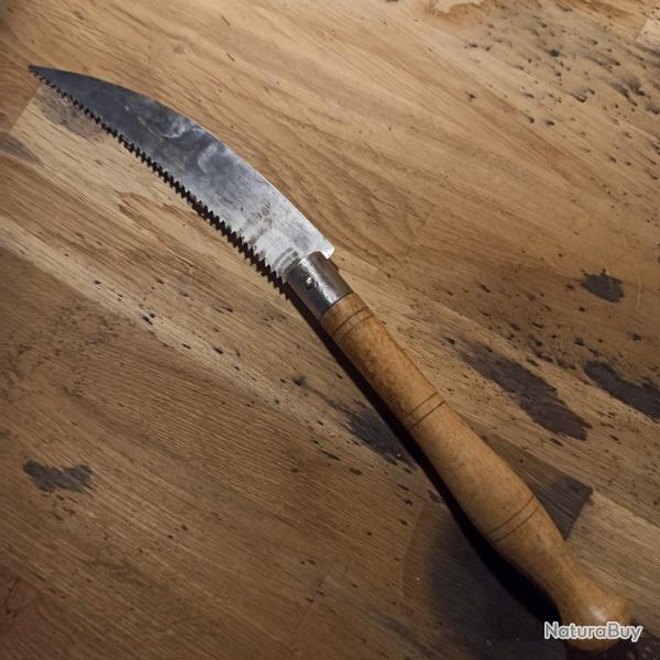 Couteau pliant lame-scie original, poign�e r�gionale en bois, curiosit� ?