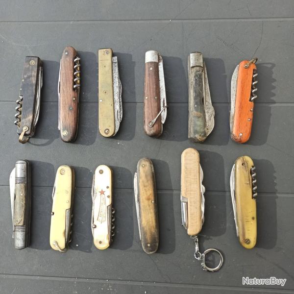 Lot indissociable de 12 couteaux pliants divers : Pradel, VM, ...