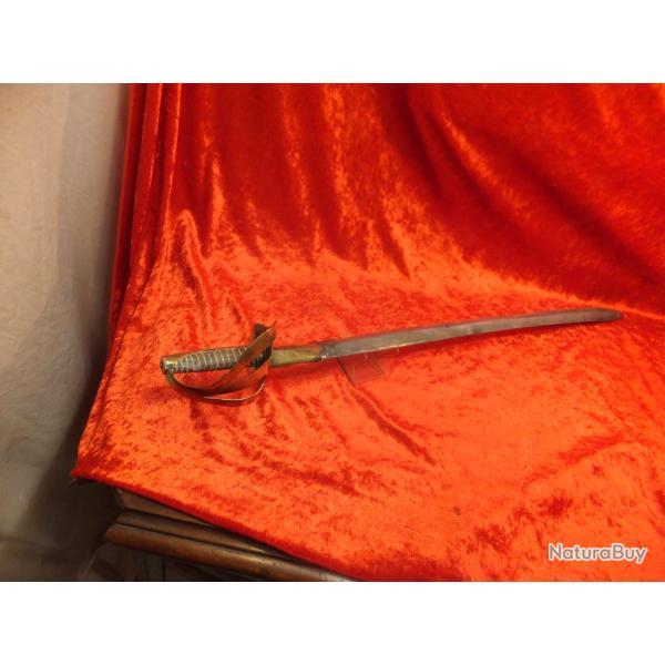 Sabre d'enfant, en fer et pogn en laiton avec filigrane