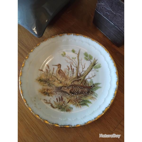 Assiette en porcelaine b�casse