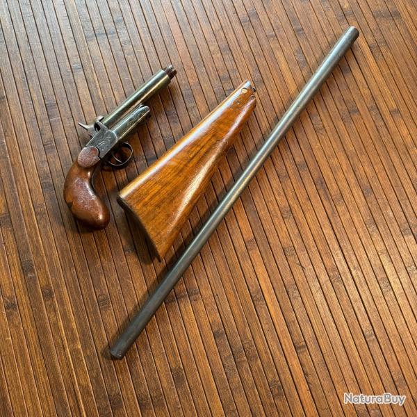 PISTOLET CARBINE DE BRACONNIER D�MONTABLE EN TROIS PARTIES CANON BASCULANT CALIBRE 20
