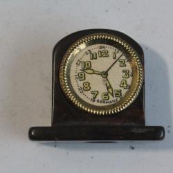 Ancien Taille crayon Horloge bakélite ?