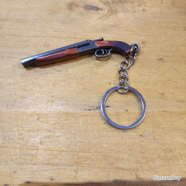 Porte cl� fusil canon sci�