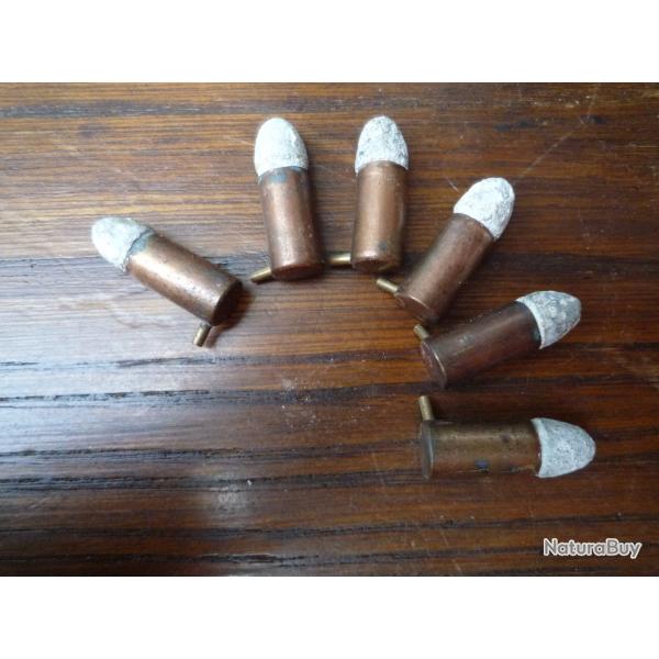 6 anciennes cartouches  broche d'origine  poudre noire calibre 7 mm