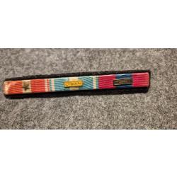 Barrette de rappel de trois m&eacute;dailles