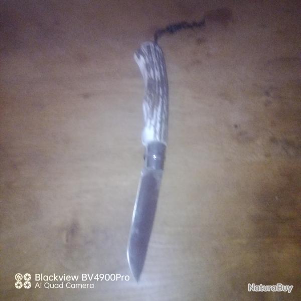 Opinel cerf no12 ....leger defaut!!Bien lire l annonce.