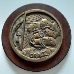 Tape de bouche en bronze du navire Orage. Très bel objet ancien.