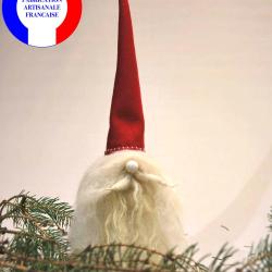 Lutin de No&euml;l scandinave avec barbe en laine blanche et chapeau en drap de laine rouge