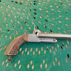 Pistolet à broche deux canons avec sécurité