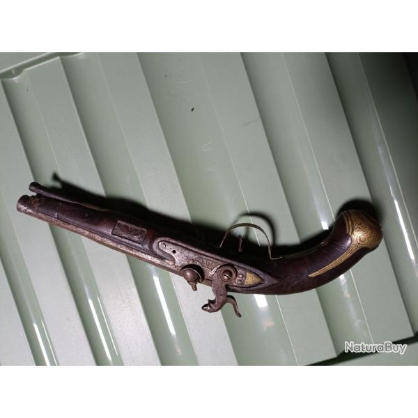 Pistolet a percussion a restaurer