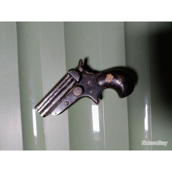 Derringer 4 canons percuteur rotatif