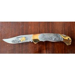 Couteau pliant de collection avec relief sur la poignée métallique fait par Boker, Solingen