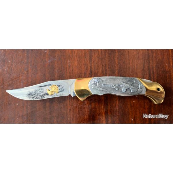 Couteau pliant de collection avec relief sur la poigne mtallique fait par Boker, Solingen