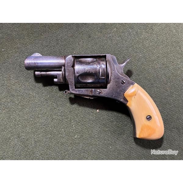 JOLI REVOLVER BULLDOG ELG  � crosse ivoire cal. 320 pr�voir petite remise en �tat