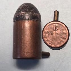 Une cartouche 12mm Lefaucheux a broche de Bachmann a Bruxelles poudre noire