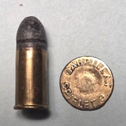 Une cartouche Gaupillat Spirlet 9mm CF interne laiton ,balle plomb poudre noire