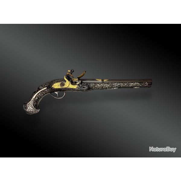PISTOLET  SILEX, POUR LE MARCH ORIENTAL, ARGENT ET DAMASQUINE D'OR Europe - XVIIIme sicle