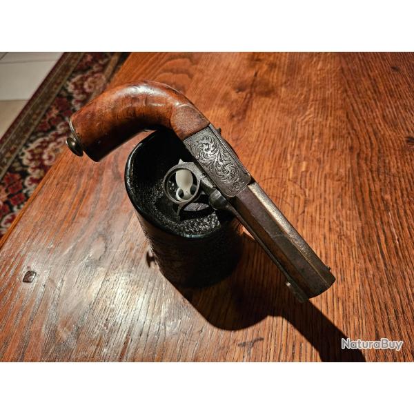 Pistolet � percussion, � syst�me