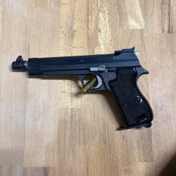 Sig P210-5 avec sa boîte d'origine et sa cible test
