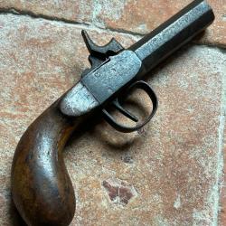 Pistolet de coffre à percussion