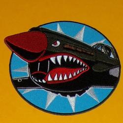 TISSU PATCH :  CURTIS THE FYING TIGER  , DIAMETRE 10 CM , BON ETAT VOIR PHOTOS . POUR TOUT RENSEIGNE