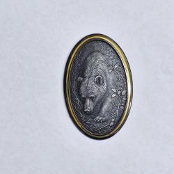 Calotte avec un ours.